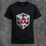 Black t-shirt with geometric cube design on a textured gray background