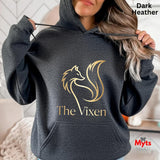 Dark Heather hoodie with 'The Vixen' logo and text, worn by a person.