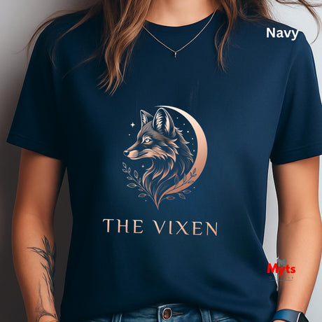 Woman wearing a Navy The Vixen Moon fox graphic T-shirt featuring a detailed celestial fox portrait, crescent moon, stars and botanical artwork.