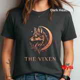 Woman wearing a Dark Heather The Vixen Moon fox graphic T-shirt featuring a detailed celestial fox portrait, crescent moon, stars and botanical artwork.