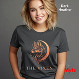 Woman wearing a Dark Heather The Vixen Moon fox graphic T-shirt featuring a detailed celestial fox portrait, crescent moon, stars and botanical artwork.
