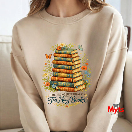 Sand sweatshirt with a design of books and flowers, featuring the text 'There's no such thing as too many books'.