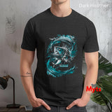 Person wearing a black t-shirt with a blue fish graphic design, standing against a textured wall.