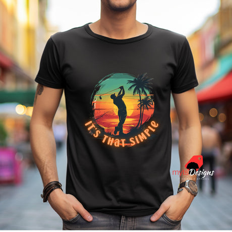 Person wearing a black t-shirt with a colorful graphic and text, standing in an urban setting.