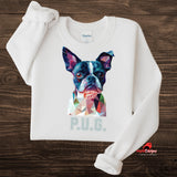 A white sweatshirt displayed on a wooden surface featuring a vibrant polygon-style dog portrait with the text “P.U.G.” below, designed by MytsDesigns

