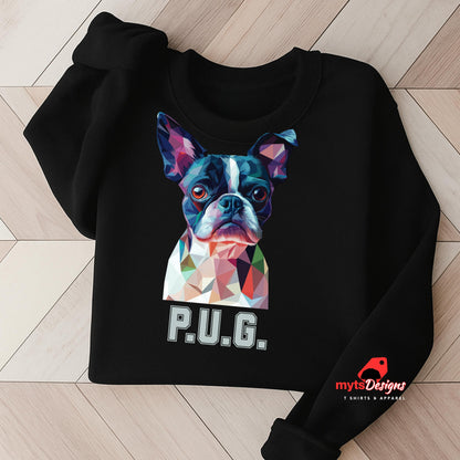 A black sweatshirt displayed on a wooden surface featuring a vibrant polygon-style dog portrait with the text “P.U.G.” below, designed by MytsDesigns