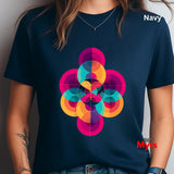 Navy t-shirt with a colorful geometric design worn by a person.