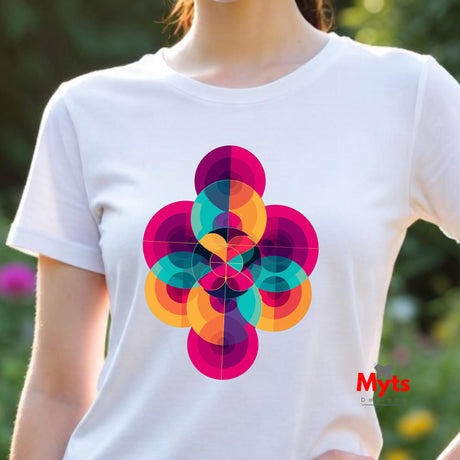 Person wearing a white t-shirt with a colorful flower design, standing outdoors.