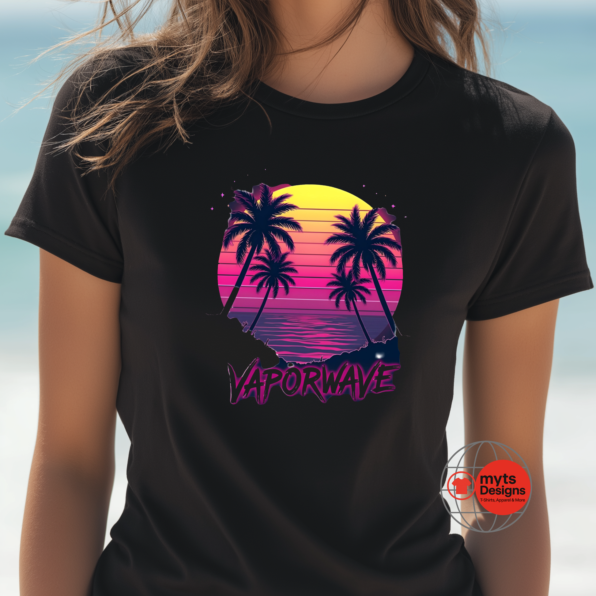 Person wearing a black t-shirt with a vaporwave design featuring palm trees and a sunset.