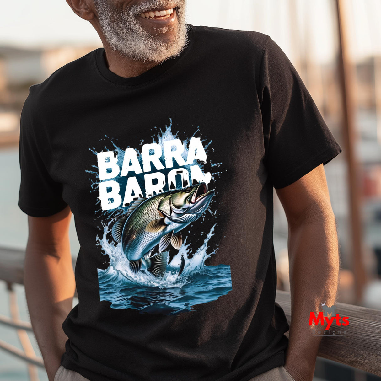 Person wearing a black t-shirt with a fish graphic and 'BARRA BARRA' text.