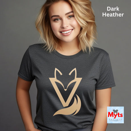 Woman wearing a Dark Heather Vixen minimalist fox graphic T-shirt featuring a modern gold-toned geometric fox symbol with a flowing tail design.