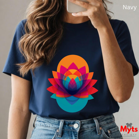 Person wearing a navy blue t-shirt with a colorful lotus flower design, holding a phone.