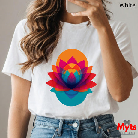 Person wearing a white t-shirt with a colorful flower design, holding a phone.