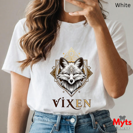 Person wearing a white t-shirt with a fox graphic and 'Vixen' text, holding a phone.