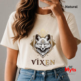 Person wearing a Natural t-shirt with a fox graphic and 'Vixen' text, holding a phone.