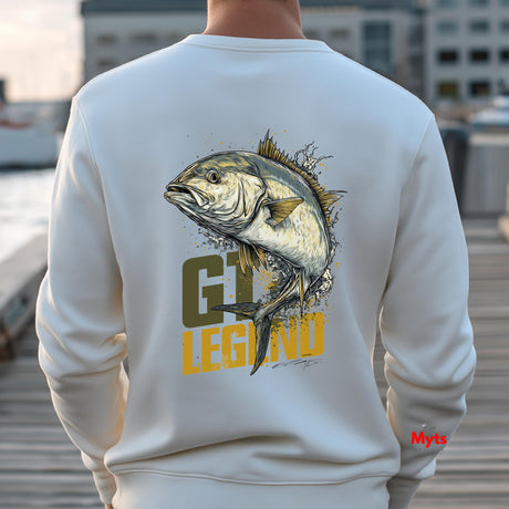Person wearing a white sweatshirt with a fish graphic and 'GT Legend' text on the back, standing outdoors.