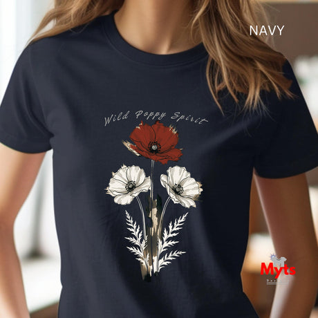 A woman wearing a navy blue t-shirt with a graphic of three poppies (one red, two white) and the text 'Wild Poppy Spirit'. The image has 'NAVY' text overlay in the top right and a 'Myts' logo in the bottom right.