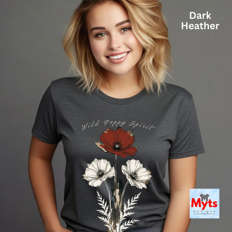 A woman wearing a dark heather gray graphic t-shirt with a red and white poppy design and the text 'Wild Poppy Spirit'. The image has a gray background, a text overlay reading 'Dark Heather' in the top right, and a 'Myts Designs' logo in the bottom right corner.