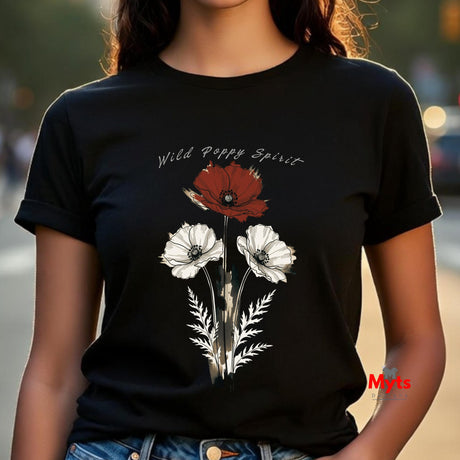 A woman wearing a black short-sleeve t-shirt with a graphic of three poppies (one red, two white) and the text 'Wild Poppy Spirit'.