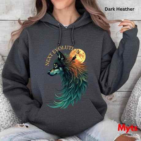 A woman wearing a dark heather hoodie with a colorful graphic of a wolf in front of a full moon and the text 'NEXT EVOLUTION'.