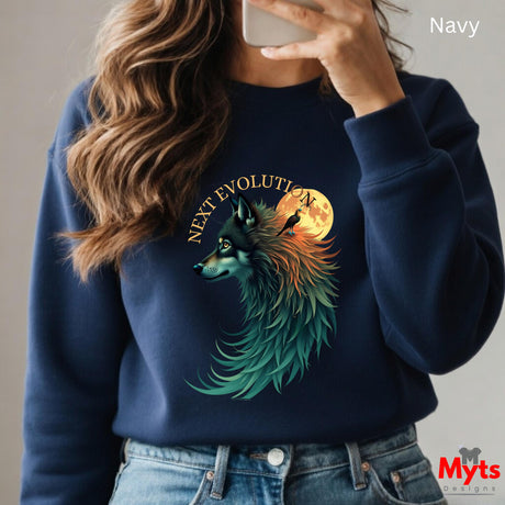 A person wearing a navy crewneck sweatshirt with a graphic of a wolf in front of a full moon and the text 'NEXT EVOLUTION'. The person is taking a mirror selfie, and the background is a plain light gray wall.