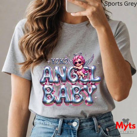 Person wearing a gray t-shirt with 'Y2K2 Angel Baby' design, taking a selfie.