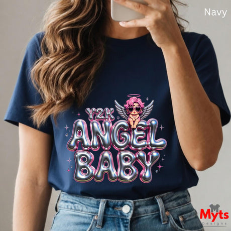 Person wearing a navy t-shirt with 'Y2K Angel Baby' design, holding a phone.