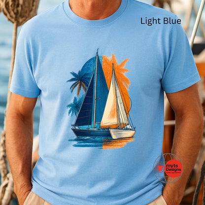 Light blue t-shirt with a sailboat and palm tree design, worn by a person.