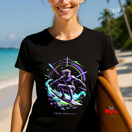 Person wearing a black t-shirt with a colorful graphic design on a beach