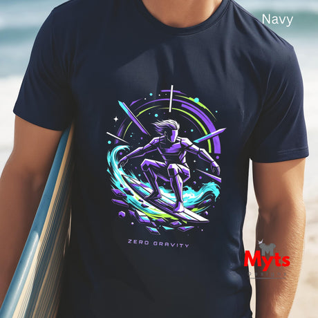 Navy t-shirt with a colorful graphic design of a person on a surfboard, held by a person on a beach.