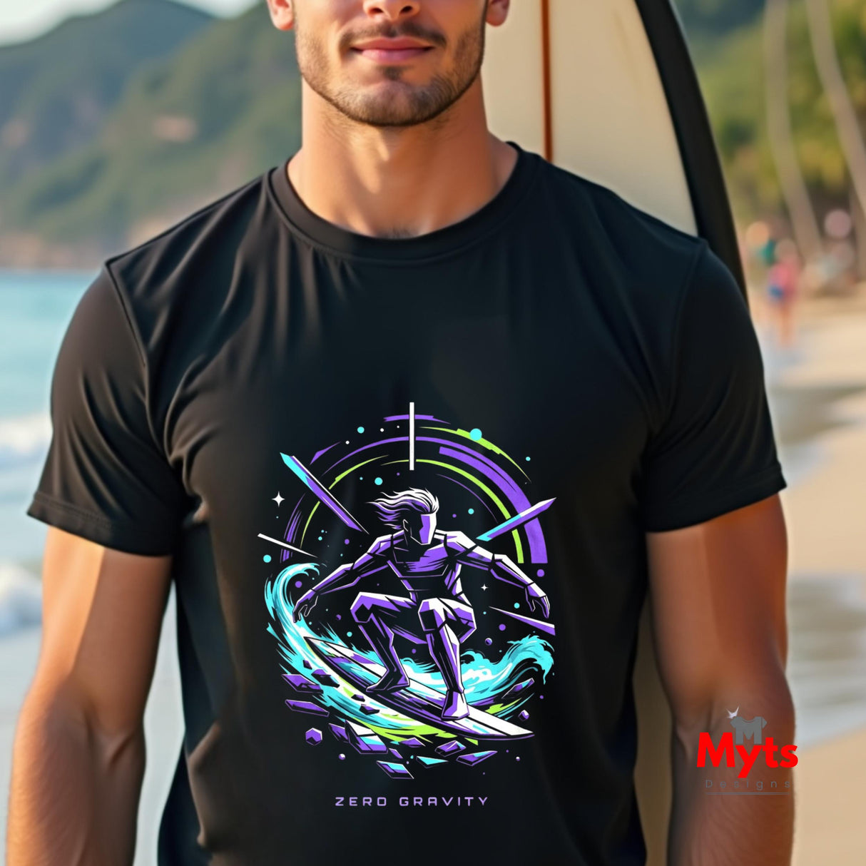 Man wearing a black t-shirt with a colorful graphic design on a beach.