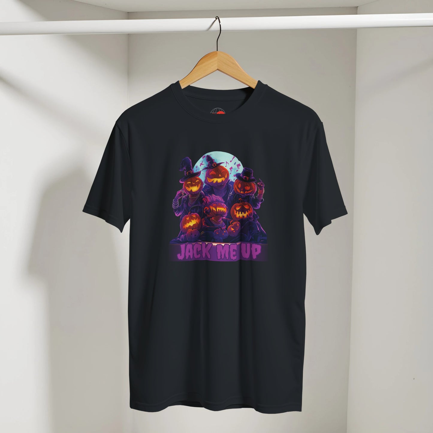 Black t-shirt with Halloween-themed design featuring pumpkins and 'Jack me up' text on a hanger against a white wall.