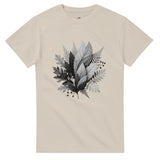 Beige t-shirt with black and white leaf design on a white background