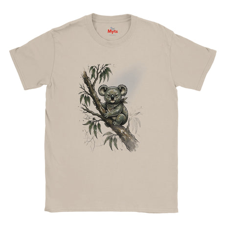 A Natural short-sleeve crewneck t-shirt featuring a watercolor-style graphic of a koala sitting on a tree branch with eucalyptus leaves. The brand name 'Myts' is printed in red inside the collar.