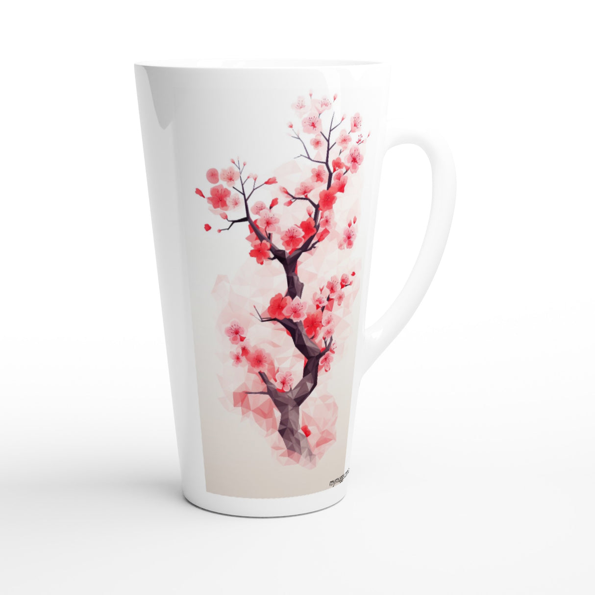 A tall white ceramic latte mug featuring a watercolor-style print of a cherry blossom tree with pink flowers and a dark brown branch, set against a clean white background.