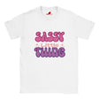 White t-shirt with the text 'Sassy Little Thing' printed in pink and purple.