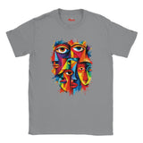 A gray short-sleeve crewneck t-shirt featuring a colorful graphic print of multiple stylized faces with eyes, rendered in a vibrant watercolor or paint-splatter style. The brand name 'Myts' is printed inside the collar.