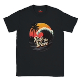 Black t-shirt with 'Ride the Wave' graphic design featuring a sunset and palm trees on a white background.