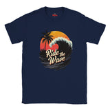 Navy blue t-shirt with 'Ride the Wave' graphic design featuring a sunset and palm trees on a white background.