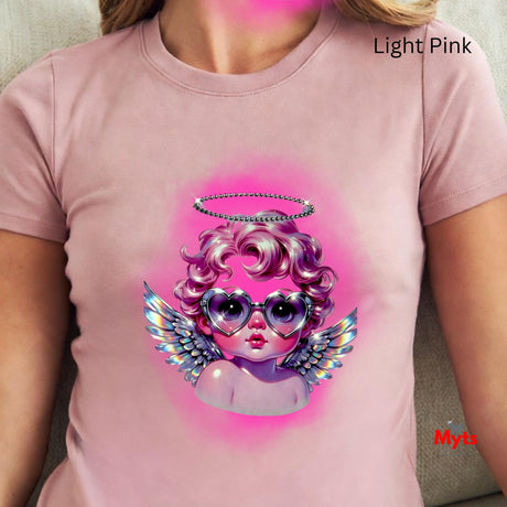Light pink t-shirt with a colorful graphic design of a face with wings and a halo.