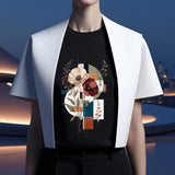 A model wearing a black graphic t-shirt with a floral abstract print, styled with a white sleeveless vest against a futuristic dark blue background.