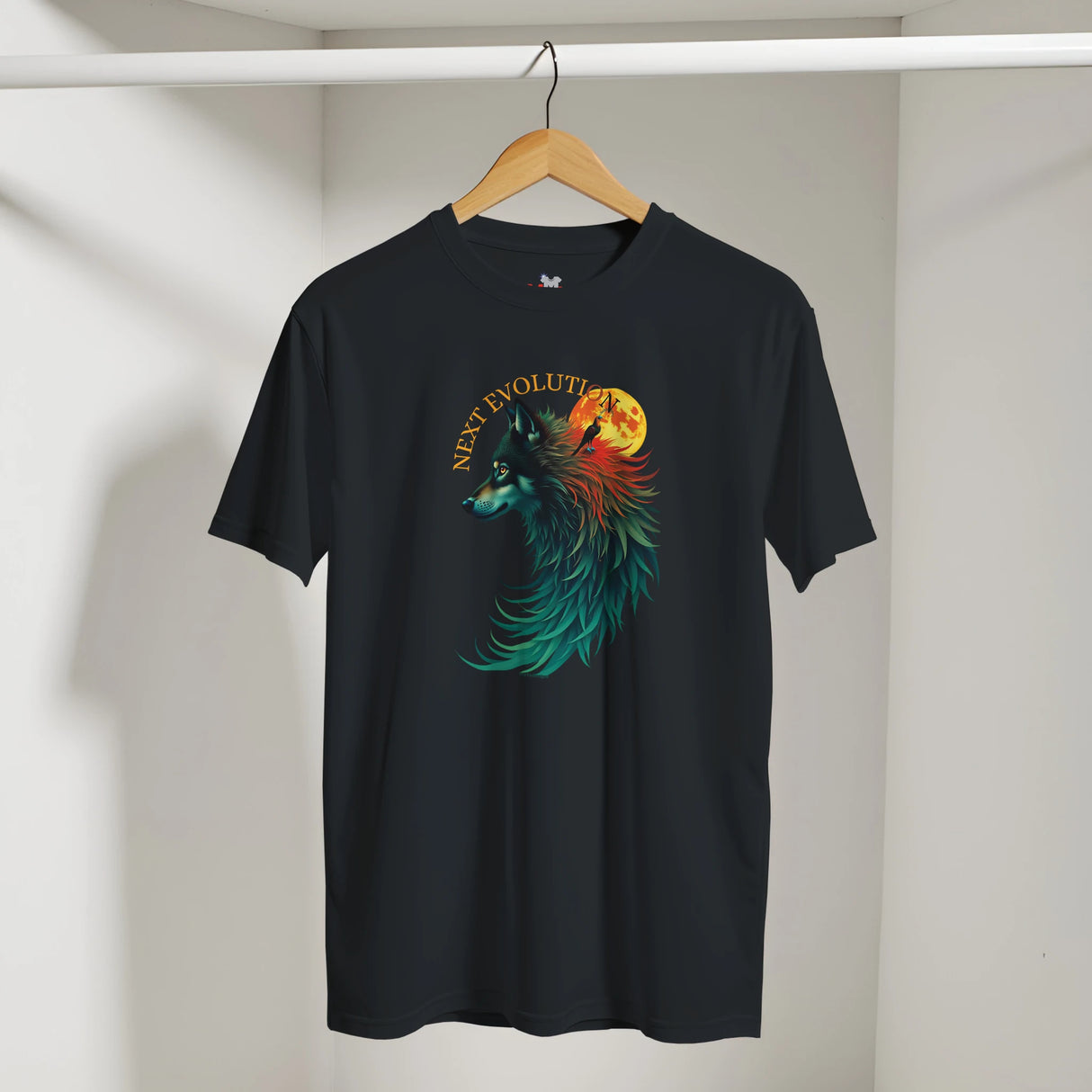 A black short-sleeve t-shirt hanging on a wooden hanger against a light gray wall. The shirt features a colorful graphic of a wolf's head in profile with teal, green, and orange details, set against a yellow full moon, with the text 'NEW EVOLUTION' arched above it.