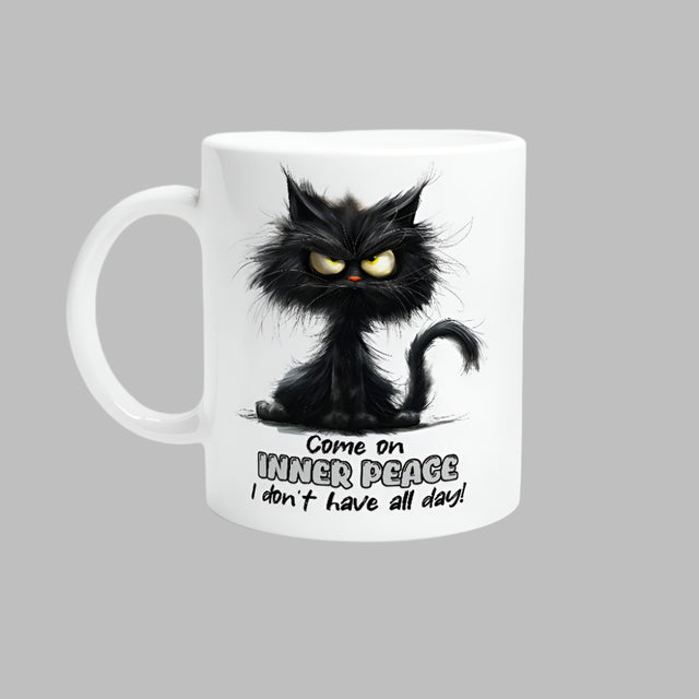 A white ceramic mug with a printed black cat design, text, and a barcode.