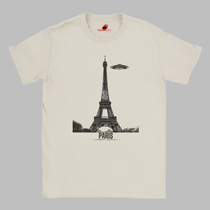Front view of a white soft casual tee featuring a whimsical graphic of the Eiffel Tower with a retro‑style spaceship orbiting it, printed on ultra‑soft Gildan 64000 cotton.