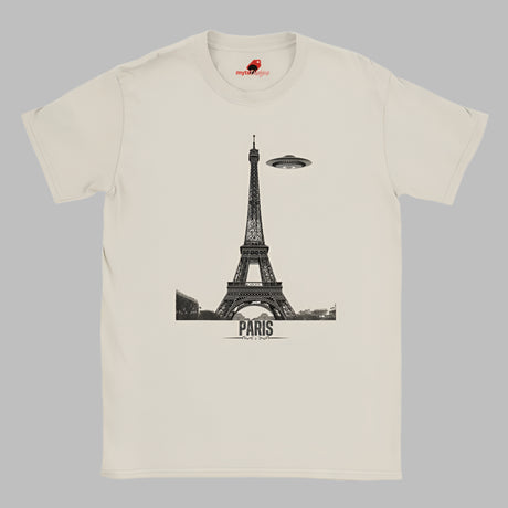 Front view of a white soft casual tee featuring a whimsical graphic of the Eiffel Tower with a retro‑style spaceship orbiting it, printed on ultra‑soft Gildan 64000 cotton.
