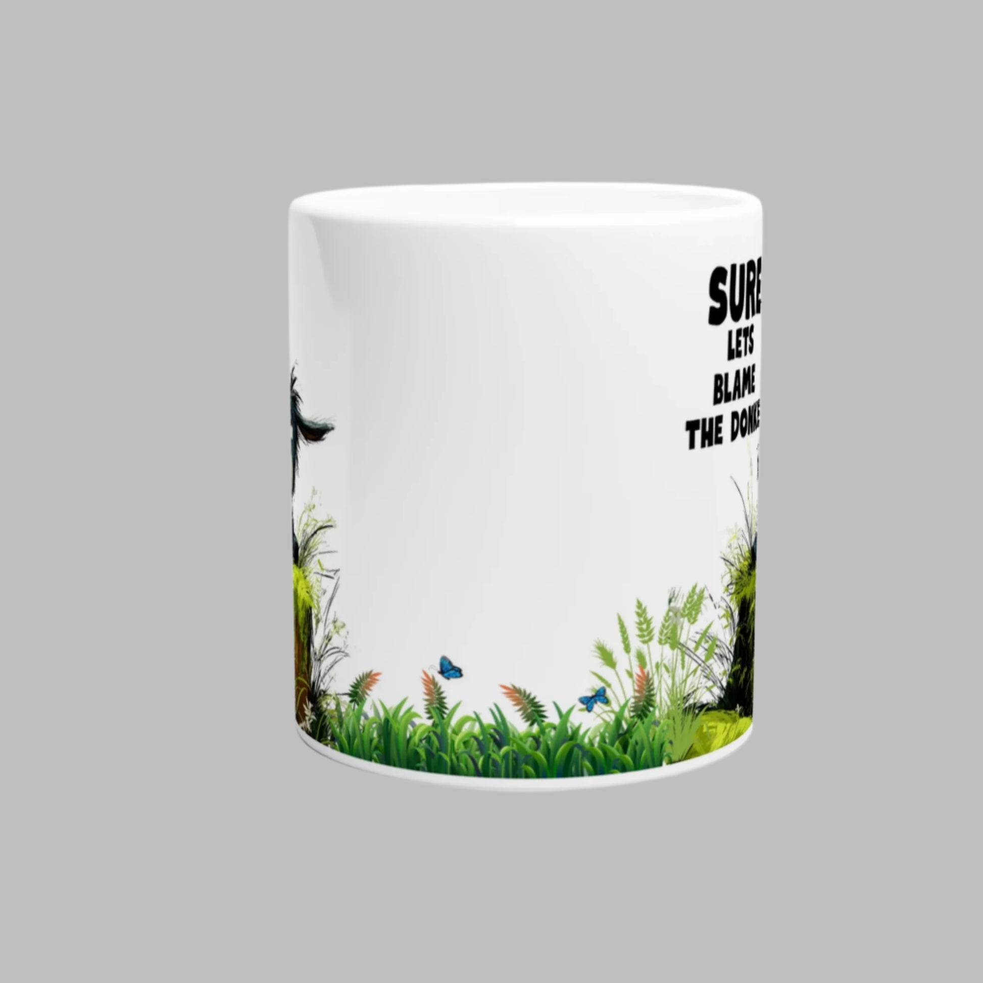 Side view of a white ceramic coffee mug