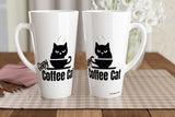 Two white ceramic coffee mugs with a black cartoon cat graphic and the words 'Crazy Coffee Cat' printed on them, displayed on a checkered placemat on a wooden table.