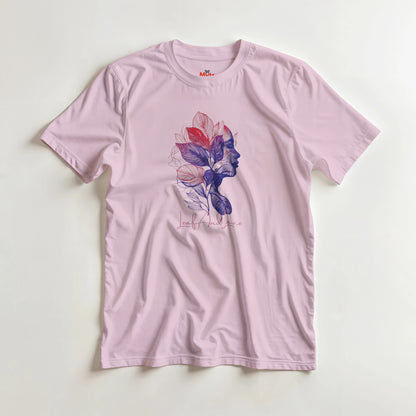 Pink t-shirt with a colorful graphic design on a light gray background