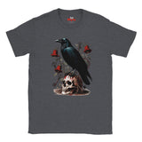 A dark heather gray t-shirt featuring a gothic graphic print of a black raven perched on a skull, surrounded by red bells and keys.