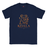 A navy blue short-sleeve crewneck t-shirt featuring a gold graphic of a koala sitting on a eucalyptus branch above the text 'KOALA LIVE GENTLY'.